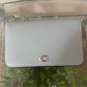 NWT Coach Light Blue card wallet.